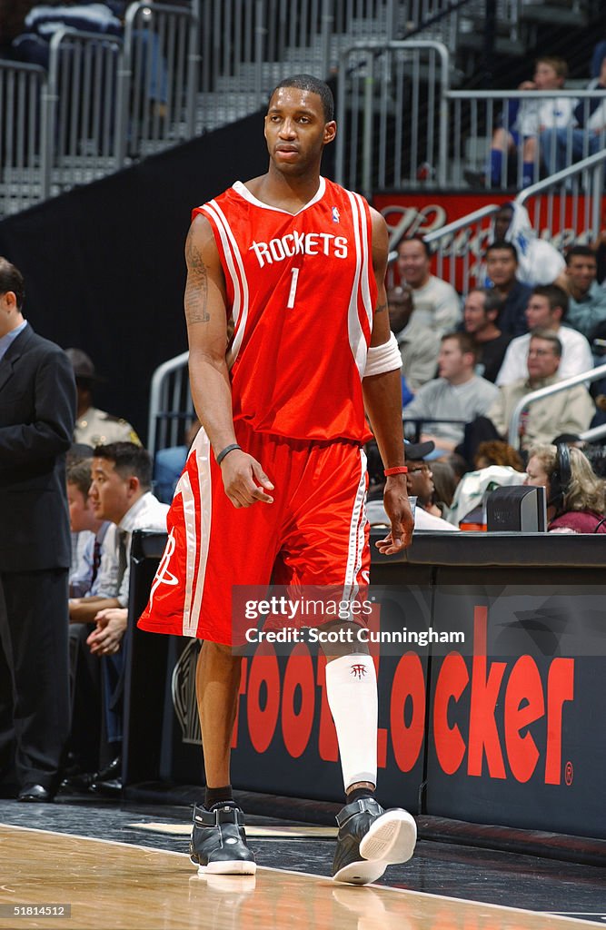 T Mac Rockets Tracy McGrady of the Houston Rockets walks on the court during the ...