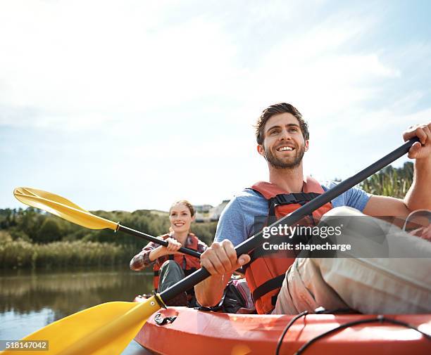 taking in the view from the river - kayak 個照片及圖片檔