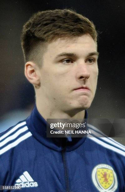 Scotland's defender Kieran Tierney stands during the national anthems at the start of the international friendly football match between Scotland and...