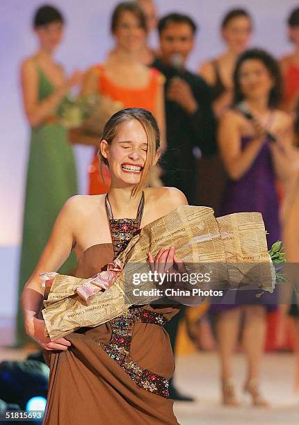 Sofie Oosterwaalal of the Netherlands smiles after winning the OLAY Elite Model Look 2004 International Finals on December 2, 2004 in Shanghai,...