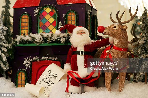 Christmas decorations are seen in the East Room during a press preview of the White House Christmas decorations December 2, 2004 in Washington, DC....