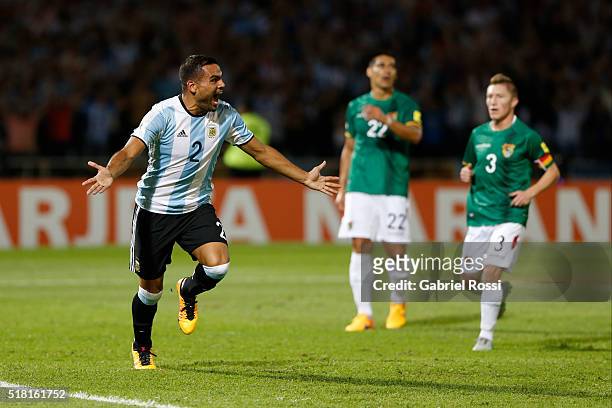Gabriel Mercado of Argentina celebrates with teammates after scoring the first goal of his team during a match between Argentina and Bolivia as part...