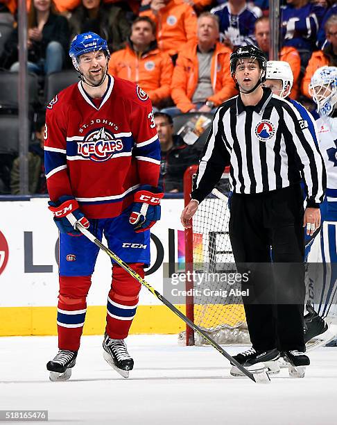 John Scott of the St. John's IceCaps reacts to a penalty call during game action against the Toronto Marlies on March 26, 2016 at Air Canada Centre...