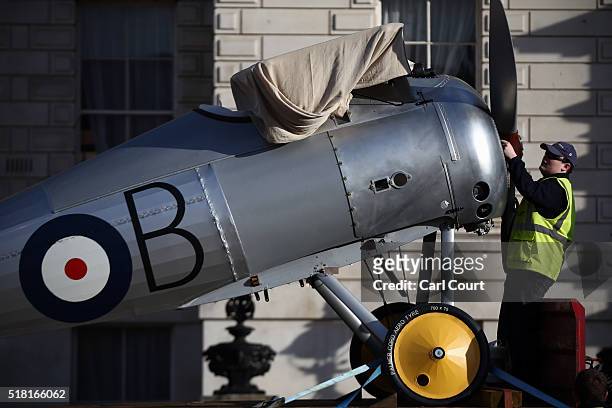 World War I Sopwith Snipe is unloaded from a truck at Horse Guards Parade on March 30, 2016 in London, England. The RAF Museum will display aircraft...