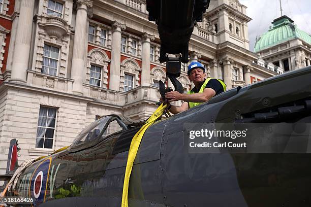 World War 2 Spitfire Mk XVI is moved into position from a truck at Horse Guards Parade on March 30, 2016 in London, England. The RAF Museum will...