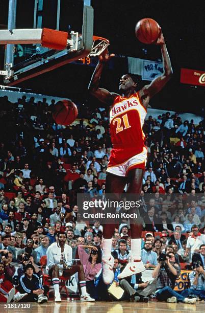 Dominique Wilkins of the Atlanta Hawks goes for a dunk during the Gatorade Slam Dunk Championship during NBA All-Star Weekend. NOTE TO USER: User...