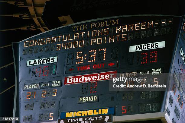 Kareem Abdul Jabbar of the Los Angeles Lakers gets acknowledged on the scoreboard for scoring 34,000 points in his NBA career during an NBA game...