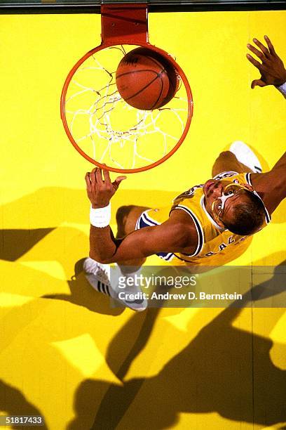 Kareem Abdul-Jabbar of the Los Angeles Lakers waits for a possible rebound during an NBA game circa 1987 at the Forum in Inglewood, California. NOTE...