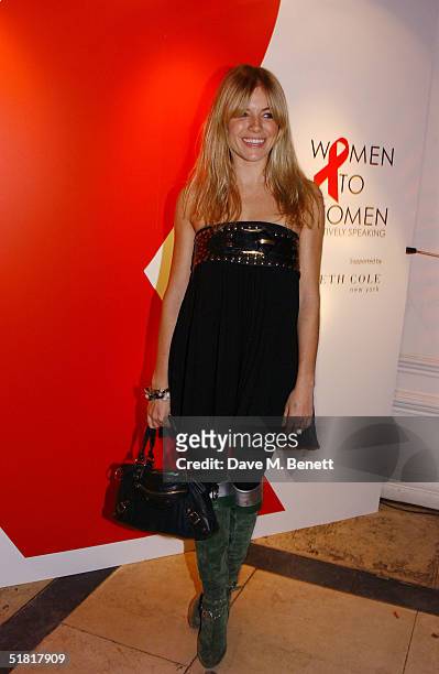 Sienna Miller attends the "Women To Women: Positively Speaking" book launch gala at The Orangery, Kensington Palace on December 2, 2004 in London....