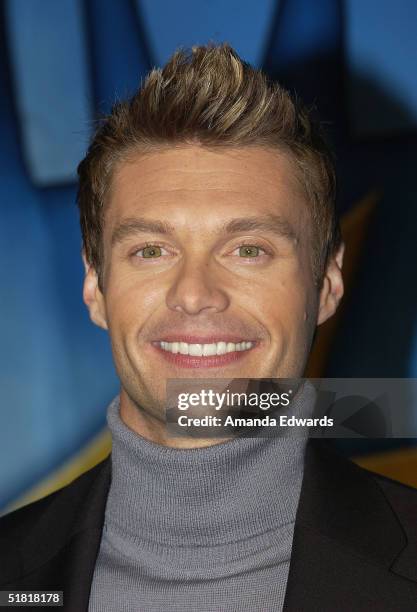 Radio personality Ryan Seacrest arrives at the Project Angel Foods Divine Design 2004 Gala on December 2, 2004 at the Barker Hangar in Santa Monica,...