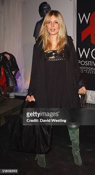 Sienna Miller attends the "Women To Women: Positively Speaking" book launch gala at The Orangery at Kensington Palace on December 2, 2004 in London,...