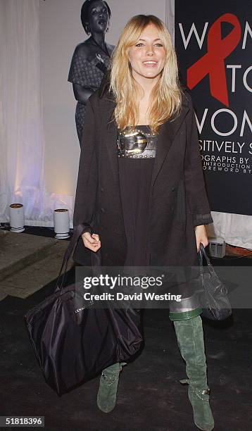 Sienna Miller attends the "Women To Women: Positively Speaking" book launch gala at The Orangery at Kensington Palace on December 2, 2004 in London,...