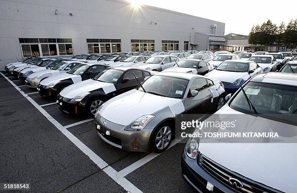 Newly assembled Fairlady Z and Skyline vehicles are parked at Nissan Tochigi factory's grounds in Utsunomiya city, about 100 kilometres north of...