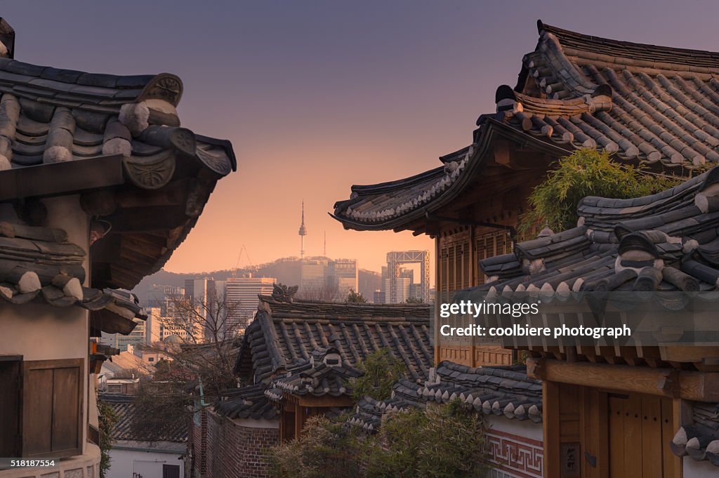 Bukchon Hanok village with Seoul city background