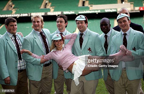 Actress and Singer Anouska De Georgiou poses with the Cambridge University rugby team to show support for Hunter's Giving Welly charitable initiative...