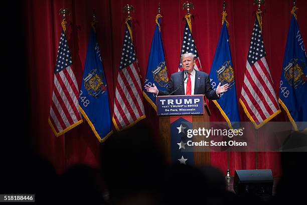 Republican presidential candidate Donald Trump speaks to guests during a campaign rally at St. Norbert College on March 30, 2016 in De Pere,...