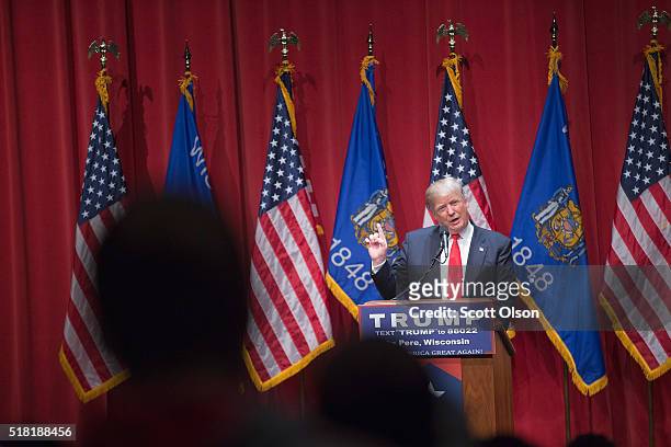 Republican presidential candidate Donald Trump speaks to guests during a campaign rally at St. Norbert College on March 30, 2016 in De Pere,...