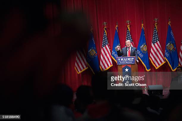 Republican presidential candidate Donald Trump speaks to guests during a campaign rally at St. Norbert College on March 30, 2016 in De Pere,...