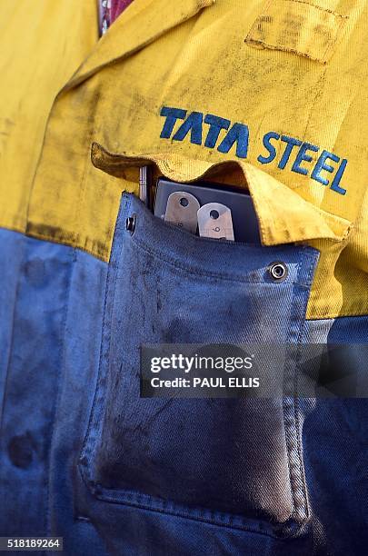 Tata Steel worker waits for British opposition Labour Party leader Jeremy Corbyn at the Tata sports and social club close to the company's works at...