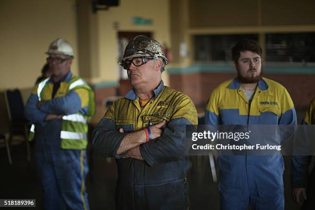 Workers from the Tata Steel plant listen to labour leader Jereym Corbyn speak to workers and union members at the Tata Sports Club on March 30, 2016...