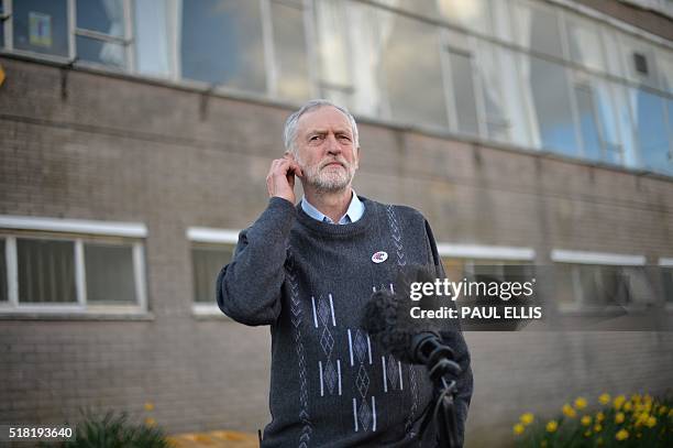 British opposition Labour Party leader Jeremy Corbyn waits to give a television interview after speaking to Tata Steel workers at the Tata sports and...