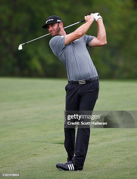 Dustin Johnson hits a shot during the pro-am prior to the start of the Shell Houston Open at the Golf Club of Houston on March 30, 2016 in Humble,...