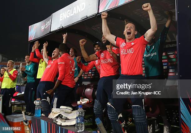 Eoin Morgan, Captain of England and his team celebrate the winning runs during the ICC World Twenty20 India 2016 Semi-Final match between England and...