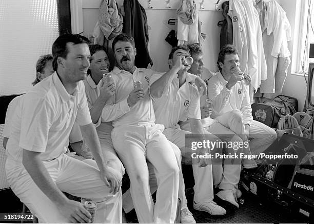 Australian players Steve Waugh, Dean Jones, David Boon, Geoff Marsh, Mark Taylor and Allan Border celebrate in their dressing room after winning the...