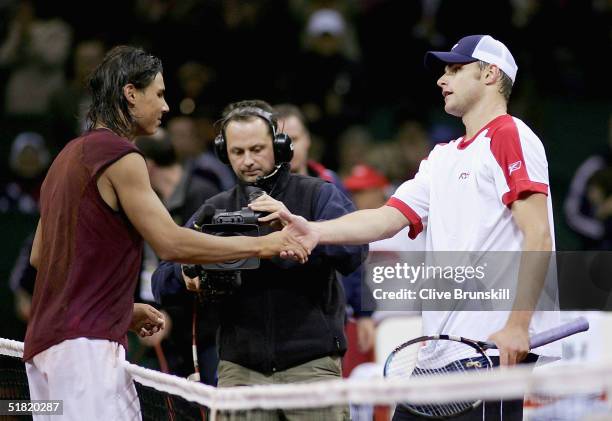 Rafael Nadal of Spain shakes hands at the net after his four set victory over Andy Roddick of the USA in the second rubber during the Davis Cup by...