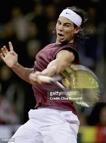 Rafael Nadal of Spain plays a forehand during his four set victory over Andy Roddick of the USA in the second rubber during the Davis Cup by BNP...
