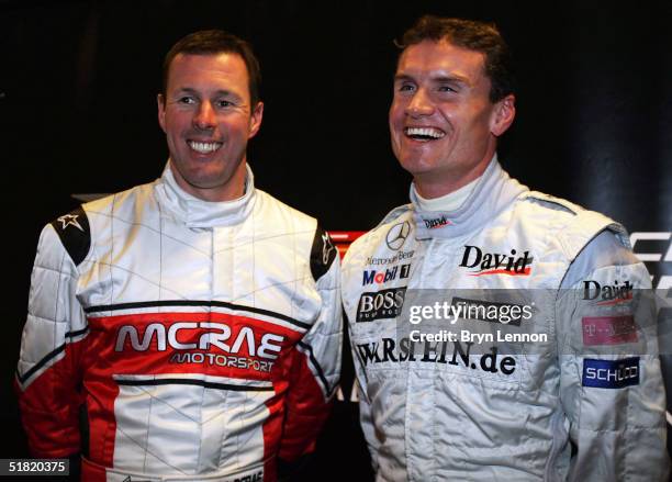 Team GB drivers Colin McRae and David Coulthard share a joke during a press conference prior to the Race of Champions at the Stade de France on...