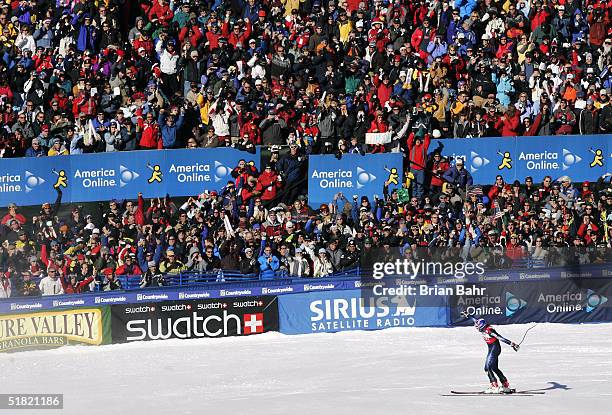 Bode Miller of the USA gestures towards the crowd after his first place finish during the mens World Cup Downhill on December 3, 2004 on the Birds of...