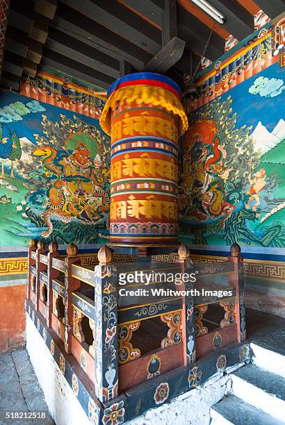 bhutan, trongsa. large buddhist prayer wheel in trongsa dzong. - trongsa district fotografías e imágenes de stock