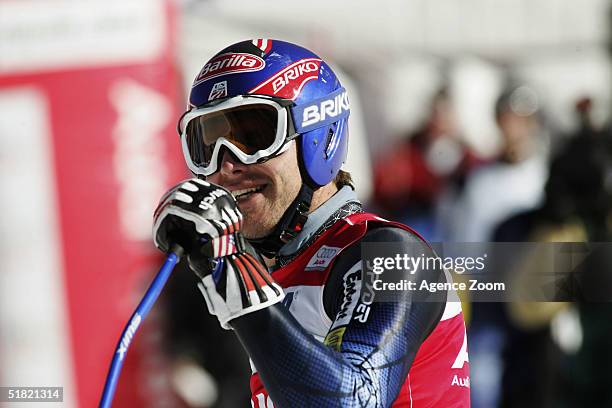 Bode Miller of USA celebrates winning the men's downhill event in the FIS Ski World Cup with second placed Daron Rahlves on December 3, 2004 in...