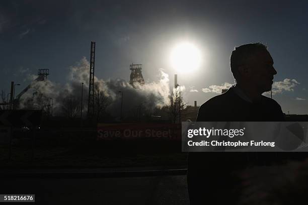 Labour leader Jeremy Corbyn speaks to the media outside the Tata Steel plant on March 30, 2016 in Port Talbot, Wales. Indian owners Tata Steel put...