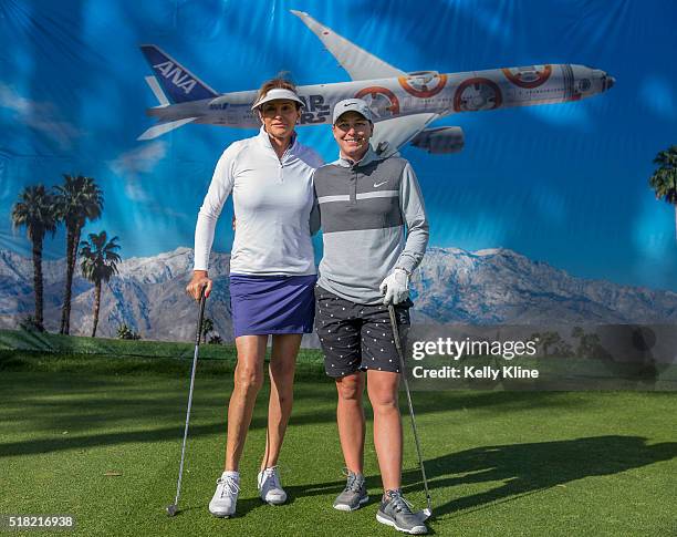 Caitlyn Jenner and Abby Wambach pose for a photo on the 8th hole during the LPGA's ANA Inspiration Pro-Am at Mission Hills Country Club on March 30,...