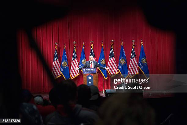 Republican presidential candidate Donald Trump speaks to guests during a campaign rally at St. Norbert College on March 30, 2016 in De Pere,...