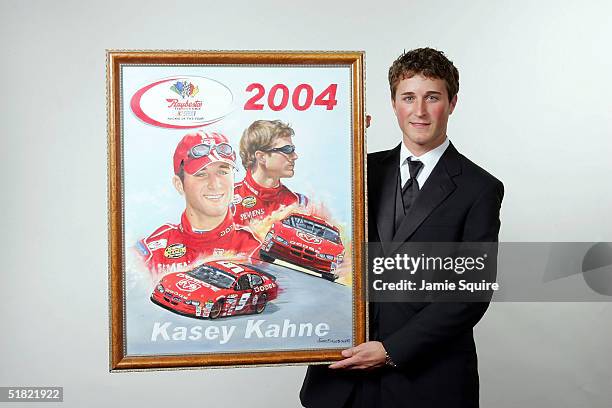 Kasey Kahne poses after winning the Rookie of the Year Award at the 2004 NASCAR Nextel Cup Awards at the Waldorf Astoria on December 3, 2004 in New...