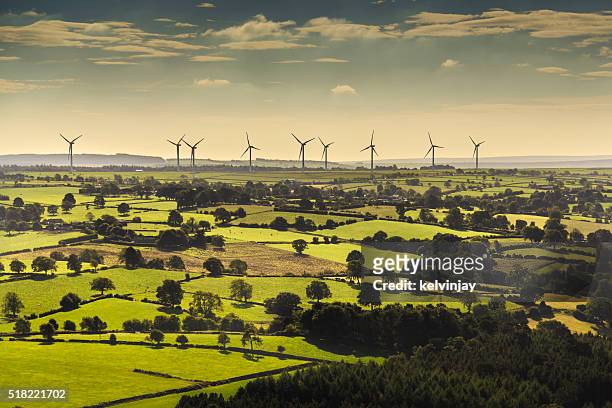 wind turbines viewed from helicopter - england bildbanksfoton och bilder