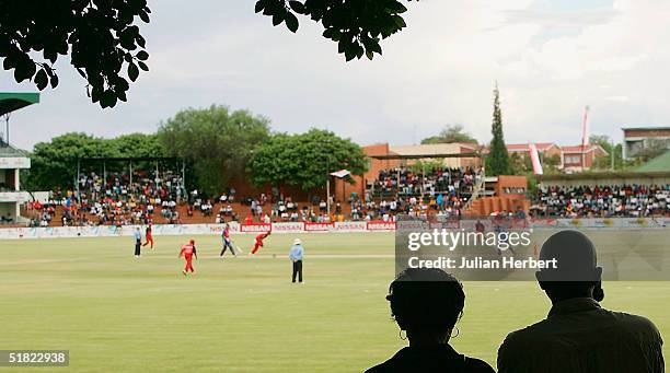 Members of the crowd watch the England innings during the 3rd One Day International played at The Queens Sports Club in Bulawayo on December 4, 2004...