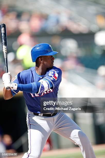 Pedro Ciriaco of the Texas Rangers bats during a spring training game against the Oakland Athletics at Hohokam Stadium on March 8, 2016 in Mesa,...