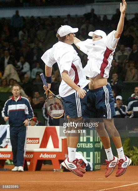 Bob Bryan of the US and his twin Mike celebrate after defeating Former number one Juan Carlos Ferrero and Tommy Robredo of Spain at the end of the...