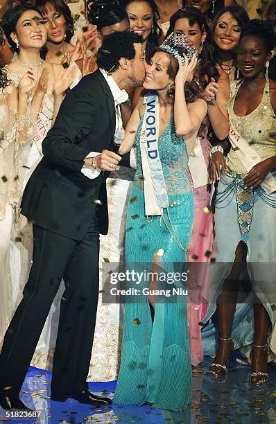 Miss Peru Maria Julia Mantilla Garcia is kissed by singer Lionel Richile after she won the title of Miss World 2004 at the 54th Miss World final...