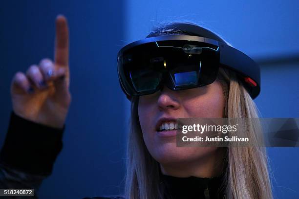 Microsoft employee Gillian Pennington demonstrates the Microsoft HoloLens augmented reality viewer during the 2016 Microsoft Build Developer...