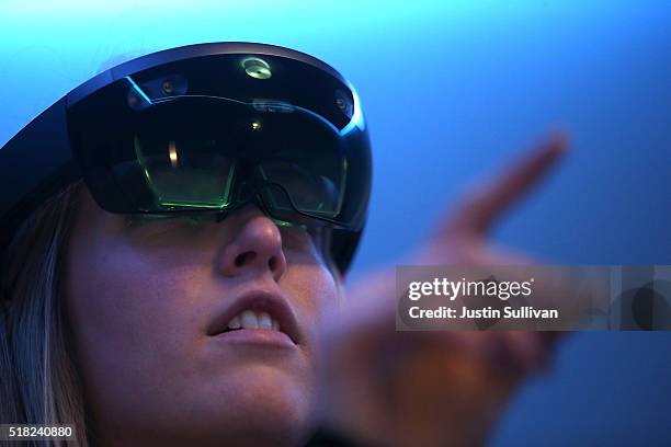 Microsoft employee Gillian Pennington demonstrates the Microsoft HoloLens augmented reality viewer during the 2016 Microsoft Build Developer...