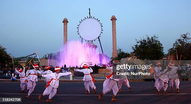 Rajasthani folk artists performing during the closing ceremony and grand procession of 'Rajasthan Festival' at Janpath in Jaipur on 30th March,2016.