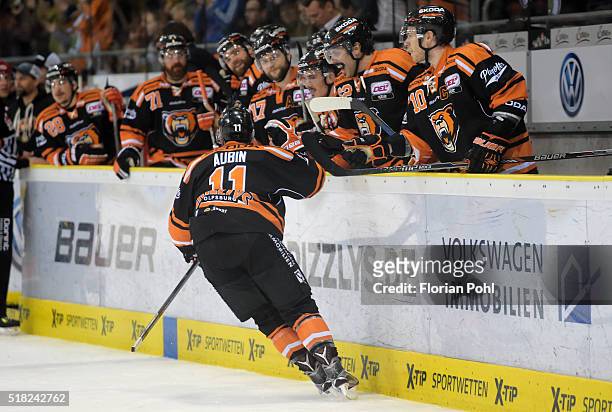 Brent Aubin and Tyler Haskins of the Grizzlys Wolfsburg celebrate after scoring the 4:2 during the game between the Grizzlys Wolfsburg and Thomas...