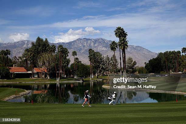 Mika Miyazato of Japan walks along the 6th hole during the Pro-Am as a preview for the 2016 ANA Inspiration Championship at the Mission Hills Country...