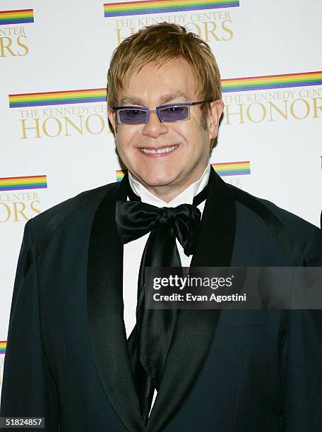 Honoree Sir Elton John arrives at the 27th Annual Kennedy Center Honors at U.S. Department of State December 4, 2004 in Washington, DC.