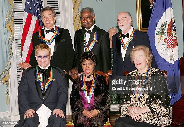The 27th Annual Kennedy Center Honorees class photograph from L-R: Warren Beatty, Ossie Davis, John Williams, Sir Elton John, Ruby Dee and Joan...